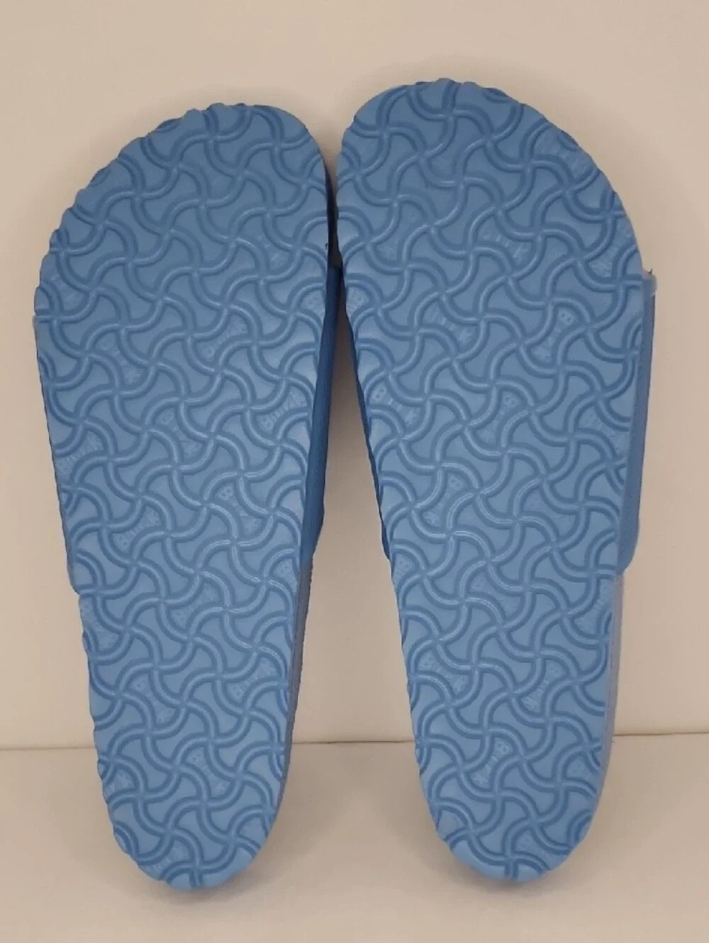 Birkenstock Light Blue Slide Sandals with Embossed Strap